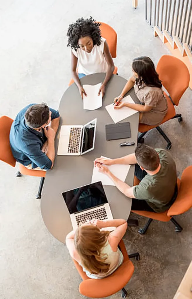 Overhead shot of a group working at a table